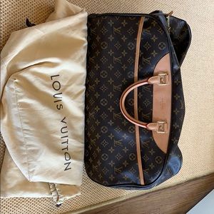 Authentic Louis Vuitton Rolling Duffle Suitcase